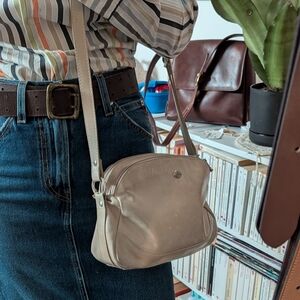 Compact Cream Crossbody Bag with Adjustable Strap